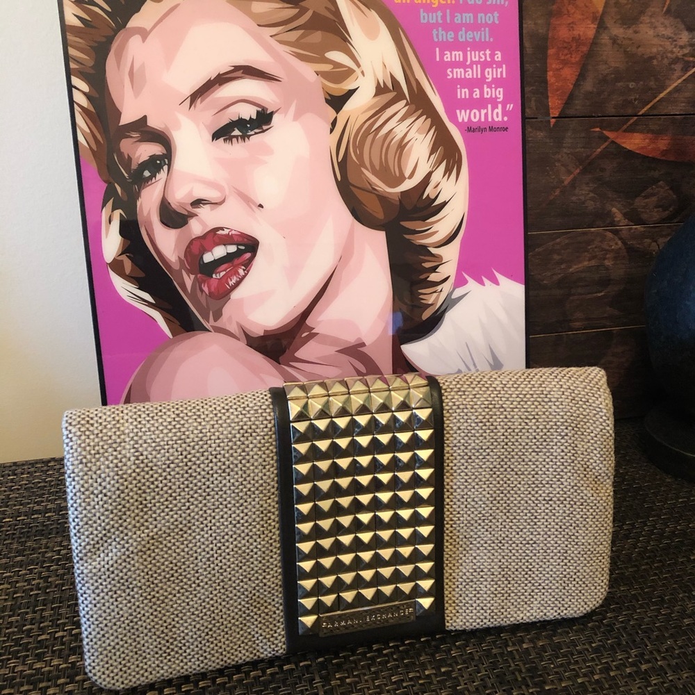 Armani Exchange clutch/ gold hardware.